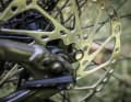 The speed sensor magnet is located in the brake disc. The system is more reliable than a spoke magnet.