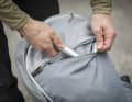 The large, deep outer pocket (not waterproof) can hold quite a lot, albeit in a somewhat disorganised manner.