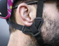 However, the height of the strap cannot be adjusted at the ears and fits a little tightly