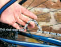 The retaining wire can be used to "fiddle" a chain lock into position without having to hold the chain ends at all times.