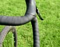The wide flare of the handlebars places the brake levers at a fairly oblique angle, does not affect their function, but looks very strange.