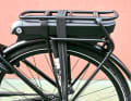 The battery position increases the rear load when transporting luggage.