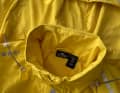 Large hood with lines to adjust the opening.
