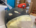 Step 1: Remove the visor, remove the upholstery, mask off, sand off the old paint.