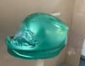 Step 3: We paint the helmet green for our desired design.