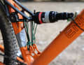 By pulling the damper mounting points together, the two ends of the breaking point are rejoined.