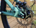 Slotted holes allow the rear brake calliper to be ideally positioned when retensioning the chain.