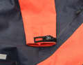 The sleeves of the Leatt jacket can be adjusted in width using Velcro. The winter's salt water has left small stains on the black back.