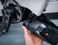 The battery cover has space for a tool kit, a helpful extra. Underneath is the cabling and the 720 Sram battery.
