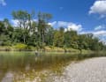 Riparian forests, rapids, bottle-green water, fly fishermen in rubber trousers: the Isar north of Munich.