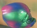 Step 4: After green, we spray blue and purple on the helmet.