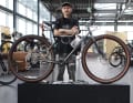 The Bespoked show bike by creative tinker Streuner rides on 32-inch wheels and uses frame parts from an old GT Karakoram steel bike from 1998.