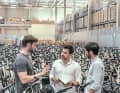 Interview in the "waiting room": Florian Groß (left) and Toussaint Wattinne (right) outline the future of Upway, editor Timo (centre) is perplexed by the sheer mass of e-bikes ready for sale.