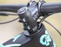Sorry, all you wrenching parents out there: The cables on the Stoll children's bike run through the headset into the frame.