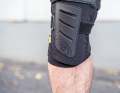 The protector plate extends as far as the base of the shin bone