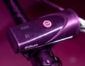 The control button and the battery indicator for the front and rear lights are located on top of the lamp