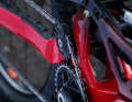 To control the pedal kickback, a guide pulley is used in the high-pivot setup