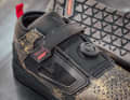 Leatt relies on a combination of twist lock and Velcro for the fastening