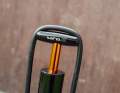 The hose hangs neatly over the handle during transport