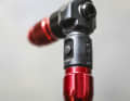 An air release button prevents the valve core from being unscrewed when unscrewing.