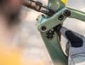 The charging port on the Moterra SL is located directly under the shock linkage in the seat tube.