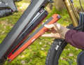 The cover on the new Liteville is no longer bolted to the battery and is also held in place by the knurled screw on the down tube.