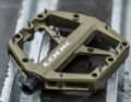The heads of the outer pins are countersunk into the pedal body to protect against pedal contact and abrasion.