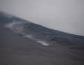 Departure from Pacaya: The air is filled with gases, smoke and dust.