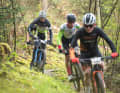 Nico fights in a group of four in his race.