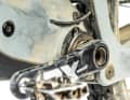 In the Bold, the shock is nested in the down tube. To adjust the sag, the Bold engineers placed a sag-o-meter on the bottom bracket. It broke.