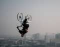 Whirling in the air in front of the Hamburg skyline. Fabio Wibmer in perhaps the most exclusive jump spot in the world.