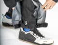 Long zips open the leg cuffs, which can also be pulled tight around the ankle with a Velcro fastener.