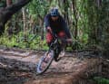 ... or pushes his bike over flow trails.