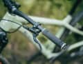 The Nukeproof Scout falls short of its potential due to the Shimano levers, which are unergonomic for braking with one finger.