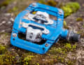 One Up relies on the SPD mechanism. However, you don't always hit the pedals as reliably as with Shimano.