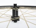 With a spoke count of 28 spokes each, Pi Rope relies on a fairly tight weave. At 28 millimetres, the Duke carbon rim is somewhat slimmer than most competitor products. The Vectran spokes require special hubs. These come from Newmen.Loading... The spokes can be individually replaced and also centred if required.Loading... The lateral stiffness of the wheels is relatively low. Overall, the lightweight wheels are very comfortable to ride. The front wheel weighs just 534 grams.Loading... In our crash test, the carbon rim failed at an energy of 18.5 joules, which corresponds to a very decent impact height of level 6. In the practical test, we were able to directly compare six current high-end wheels with each other.close gallery At a price of 2589 euros, the Pi Rope Duke Luck Jack SLS4 weighs less than 1200 grams.