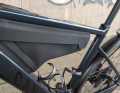 The triangular pocket is practical and perfectly tailored to the frame.