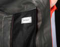 One of the slit pockets also functions as a pannier for the jacket