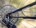 Weight saved: Where there used to be a joint, there is now only a flattened chainstay that deforms readily.