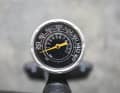 Top: The pressure gauge is located at the top of the cylinder and is easy to see. Unfortunately, it does not measure very precisely.
