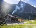 The route of the six-day Gravel Peaks event leads past the rustic alpine pastures in Flachau.