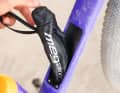 A storage compartment with waterproof bag for the most important utensils is integrated in the down tube