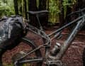 The rear rack is attached to the main mounting bolt of the bell crank and is also supported by the seat post.