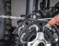 1. height clearance: If the chain is on the largest chainring, there should be a gap of one to three millimetres between the outer guide plate and the teeth of the large chainring. The thickness of a folding rule segment usually just fits between the guide plate and the large chainring. The height of the front derailleur can be adjusted using the fixing screw of the front derailleur on the frame.