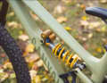 Steel spring shock absorbers, such as this model from Öhlins, usually cope better with heavy rider weights.