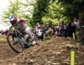 It's about to start again: the Formula 1 of biking. First Downhill World Cup: Bielsko-Biala, Poland. Here Finn Illes ducks behind the handlebars.