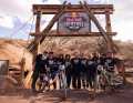 Women's power: (from left to right) Katie Holden, Robin Goomes, Georgia Astle, Casey Brown, Vero Sandler, Vinny Armstrong, Casey Kimball, Vea Verbeeck, and Michelle Parker in front of the finish coral t Red Bull Rampage in Virgin, Utah 2024.