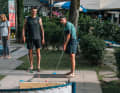 A quiet game of minigolf before the start ... | Photo : Jakub Kopecký