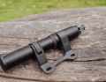The bracket secures the cylinder and handle sleeve, preventing automatic extension