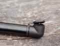 A dust cap protects the innards from dirt. Unfortunately, it comes off by itself during the journey